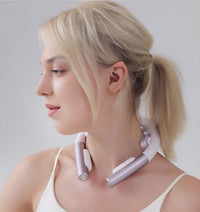 Woman wearing a futuristic neck device on a plain background